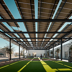 A person walking in a large building.